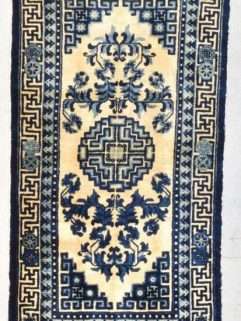 Old blue and white Chinese wool rug picture