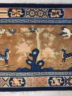 Vintage Chinese rug with deer on brown field carpet image
